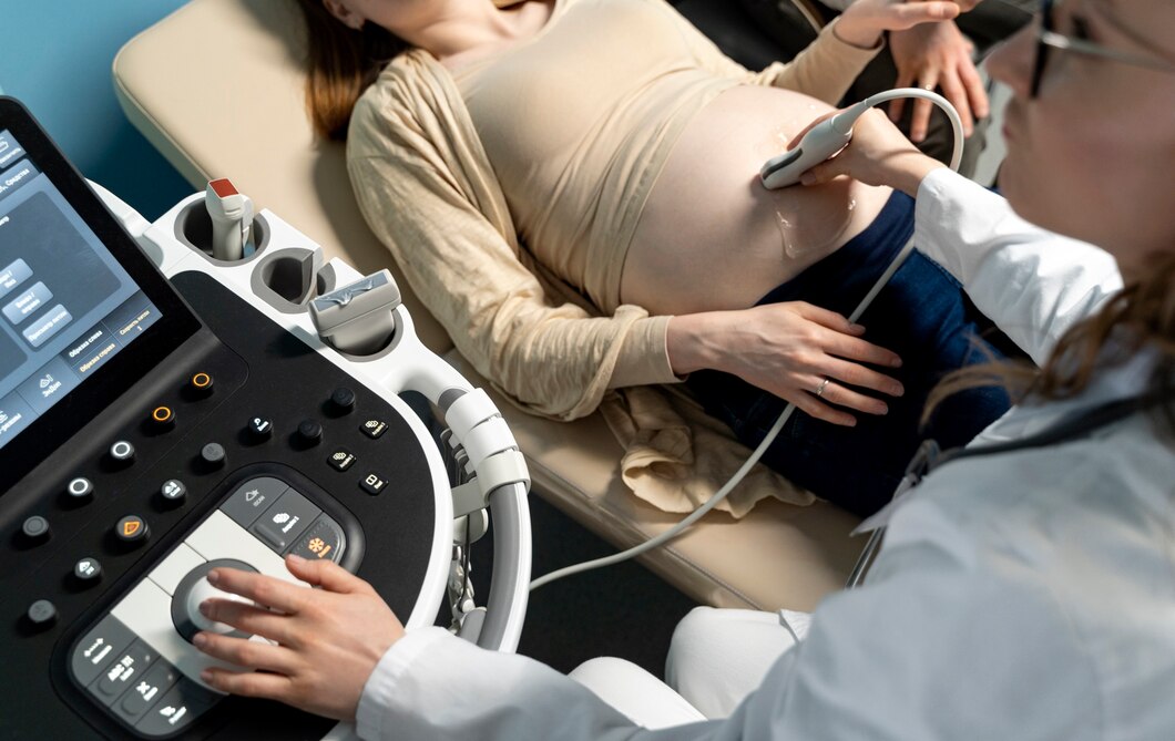 gynecologist performing ultrasound consultation